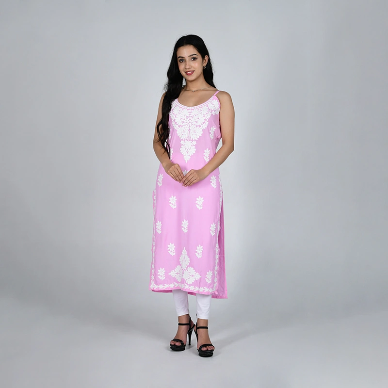 Female model in light pink printed kurti with white churidar - ethnic wear ecommerce photography by Lohar Studio Delhi